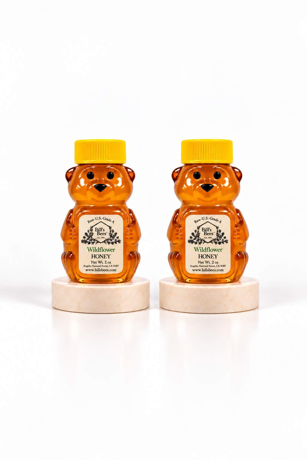 Two 2 oz Bill's Bees Wildflower Honey squeeze bears, portrait format