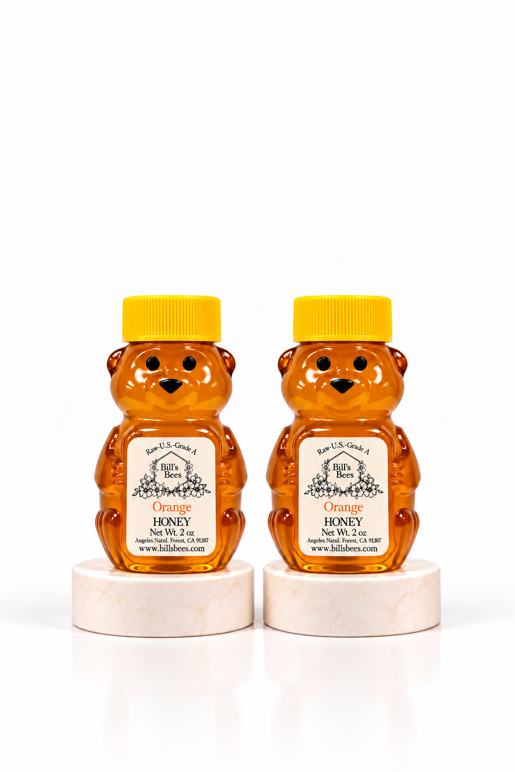 Two 2 oz Bill's Bees Orange Blossom Honey squeeze bears, portrait format