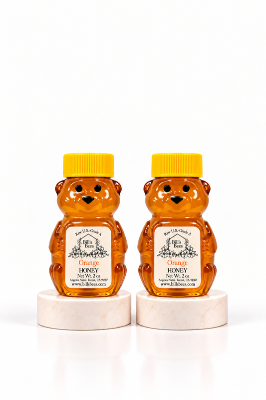 Two 2 oz Bill's Bees Orange Blossom Honey squeeze bears, portrait format