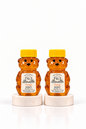 Two 2 oz Bill's Bees Orange Blossom Honey squeeze bears, portrait format