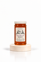 16 oz Bill's Bees Sage Blossom Honey jar on a marble pedestal, portrait format