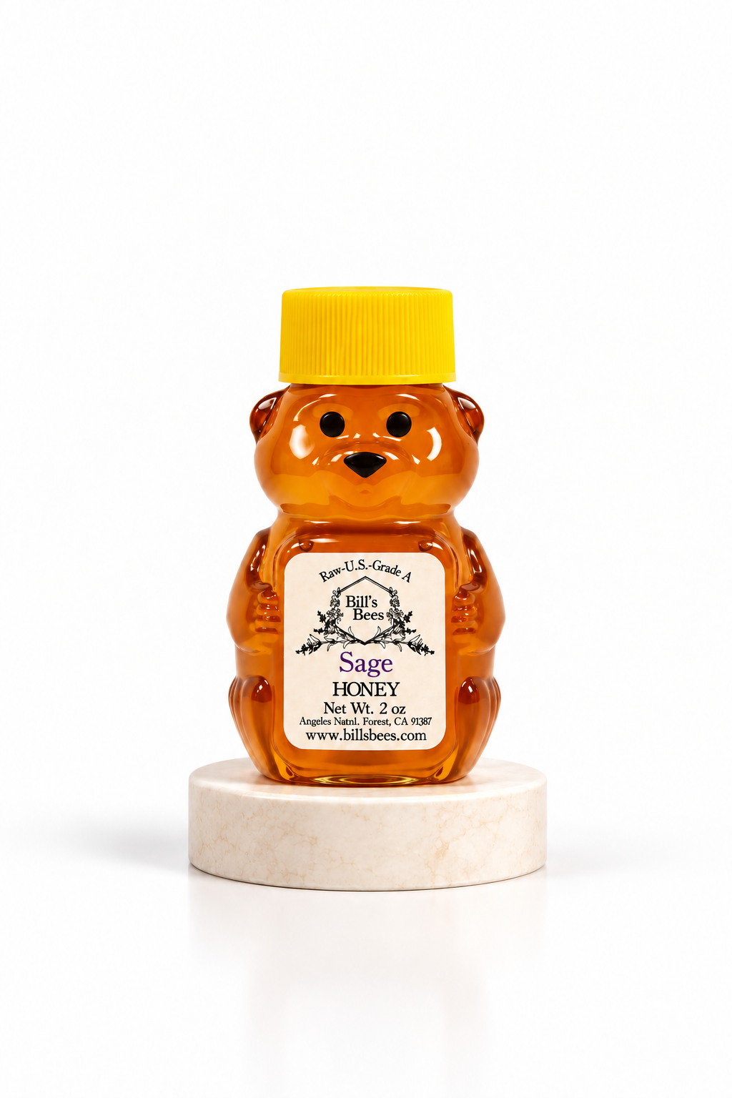 2 oz Bill's Bees Sage Blossom Honey squeeze bear on a marble pedestal, portrait format